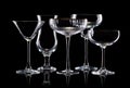 Set of different empty glasses for drinks on black background Royalty Free Stock Photo