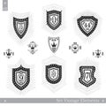 Set of different geometric shields with light ray. Hipster vintage style templates for business signs, labels, logos, identity, ba Royalty Free Stock Photo