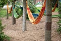 Set with different hammocks in the garden.