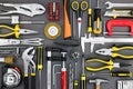 Set of different hand tools on grey background Royalty Free Stock Photo