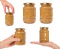 set of different home made mustard in glass bottle with hand, isolated on white background Royalty Free Stock Photo