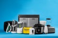 Set of different household appliances on blue background Royalty Free Stock Photo