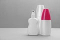 Set of different insect repellents on grey background. Space for text Royalty Free Stock Photo
