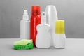 Set of different insect repellents on grey background Royalty Free Stock Photo