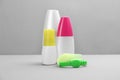 Set of different insect repellents on grey background Royalty Free Stock Photo