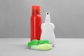 Set of different insect repellents on grey background Royalty Free Stock Photo