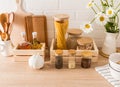 a set of different jars, containers for wounding spices and bulk products in a modern kitchen. front view of the Royalty Free Stock Photo