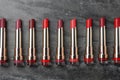 Set of different lipsticks on table. Professional makeup products Royalty Free Stock Photo