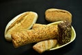 A set of different loaves lies on the table surface Royalty Free Stock Photo