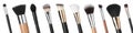 Set with different makeup brushes for applying cosmetic products on white background, banner design Royalty Free Stock Photo
