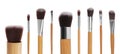 Set with different makeup brushes for applying cosmetic products on white background. Banner design Royalty Free Stock Photo