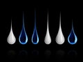 Set of different milk and water drops close-up on black Royalty Free Stock Photo