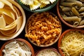 Set of different pasta in the bowls on a dark background Royalty Free Stock Photo