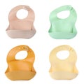 Set with different silicone baby bibs on white background, top view Royalty Free Stock Photo