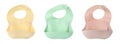 Set with different silicone baby bibs on white background, top view. Banner design Royalty Free Stock Photo