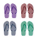 Set with different striped flip flops on white background, top view