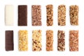 Set of different sweet protein bars on white, top view