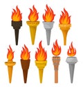 Set of different torches with brightly burning fire. Hot red-orange flame. Flat vector for mobile game or advertising Royalty Free Stock Photo