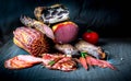 A set of different types of raw smoked meat. Royalty Free Stock Photo