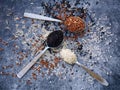 Set of different types rice on grey background: white glutinous, black, basmati, brown and mixed rice. Healthy concept. Top view. Royalty Free Stock Photo