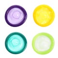 Set with different unpacked condoms on white background, top view