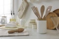 Set of different utensils and dishes on countertop in kitchen Royalty Free Stock Photo