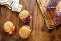 Set of different vegetarian burgers on wooden table