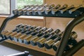 set of different weights dumbbell, on the sports rack in the gym Royalty Free Stock Photo