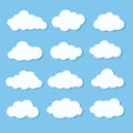 Set of different white cloud icons on blue sky for design elements, stock vector illustration Royalty Free Stock Photo