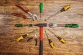 Set of different working tools on wooden background. Royalty Free Stock Photo