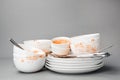 Set of dirty dishes on grey Royalty Free Stock Photo
