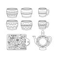 A set of dishes, cups, pots, a kitchen cutting board. Ukrainian symbols Royalty Free Stock Photo