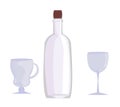 A set of dishes: an empty wine bottle and two glasses Royalty Free Stock Photo