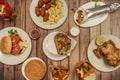 Set of dishes of a kebab restaurant with durum, lamb kebab sandwich, french fries and a burger with cheese and tomato Royalty Free Stock Photo