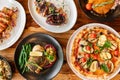 Set of dishes on the table, on a wooden background Royalty Free Stock Photo