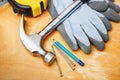 Set of DIY tools on wooden table.