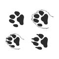 A set of dog`s paws. Black traces in different styles. Isolated on white background. Silhouettes of paws. Vector illustration. ca Royalty Free Stock Photo