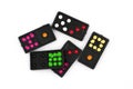 Set of dominoes, Domino lie on, Close up old black color dominoes with colorful dot pieces isolated on white background