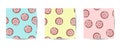 Set of donut doodles seamless patterns. Pink donuts with topping on pastel background. Cute cartoon background template