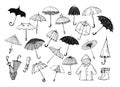 Set of doodle sketch umbrellas on white background Royalty Free Stock Photo