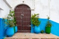 Double Doors and Plants in the Blue Kasbah of the Udayas in Rabat Morocco Royalty Free Stock Photo