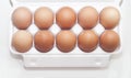 Set of a dozen brown eggs in pack