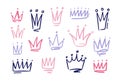 Set of drawings of doodle abatract crowns. Symbols of princess hand drawn with pink and purple freehand lines on white