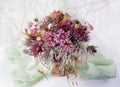 A set of dried flowers in a bouquet by the window. Royalty Free Stock Photo
