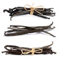 Set with dried vanilla pods on background Royalty Free Stock Photo