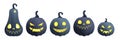 A set of dull gray pumpkins with bright glowing faces. Pumpkin lanterns for Halloween