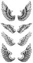 Set of eagle wings in tattoo style. Design elements for logo, label, sign, poster, t shirt. Royalty Free Stock Photo