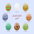 Set of Easter eggs painted in a zenart style and an unpainted white realistic egg.