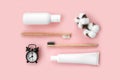 Set of eco-friendly toothbrushes, toothpaste and other tools on pink background. Royalty Free Stock Photo