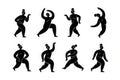 Set of eight black silhouette figures dancing and moving with energy Royalty Free Stock Photo